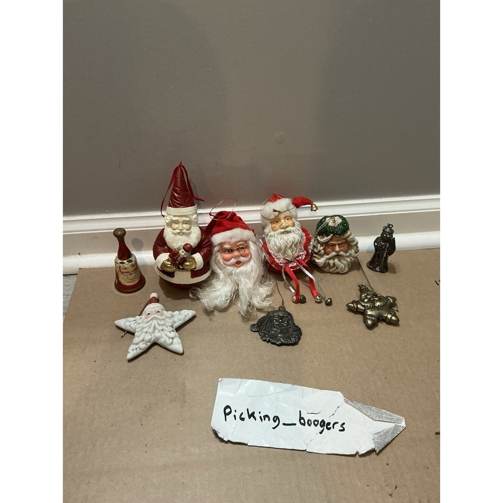 9 Vintage and decorative Santa Claus ornaments and figurines.